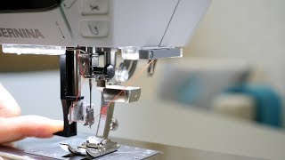 How to use the BERNINA needle threader [upl. by Noned]