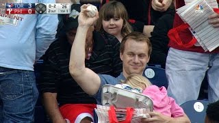 Fan grabs foul ball while holding his child [upl. by Emoryt708]