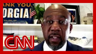 CNN projects Rev Raphael Warnock wins runoff to become first Black senator from Georgia [upl. by Ahsitniuq]